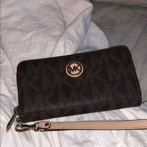 authentic michael kord wristlet/ wallet